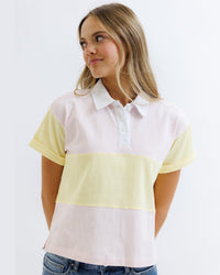 Downeast rugby tee top in classic style, featuring a comfortable fit and casual design, suitable for everyday wear.