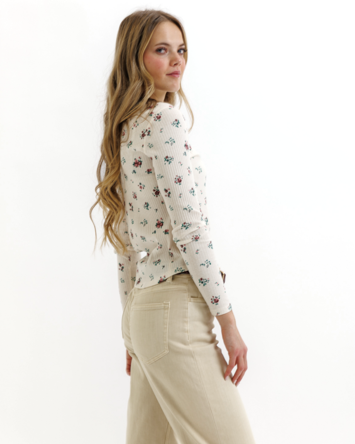 Downeast Superstition Long Sleeve Top in berry Ditsy print, showcasing a fitted long sleeve design with a round neckline.