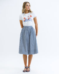 Downeast Cross Stitch Tee, women's casual top with colorful embroidered cross stitch design, short sleeves, and relaxed fit.