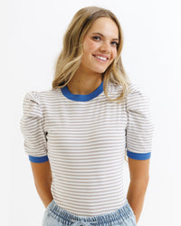Downeast Blue Skies Ahead top in cream, tan, and blue stripe, casual women's blouse with relaxed fit and soft fabric.