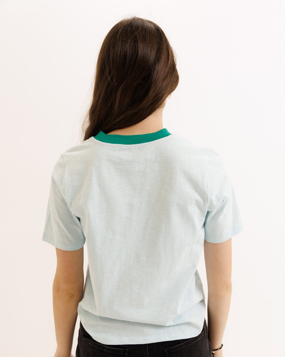 Downeast Heart To Heart Tee, a casual tops with a heart graphic, displayed on a neutral background with folded fabric.