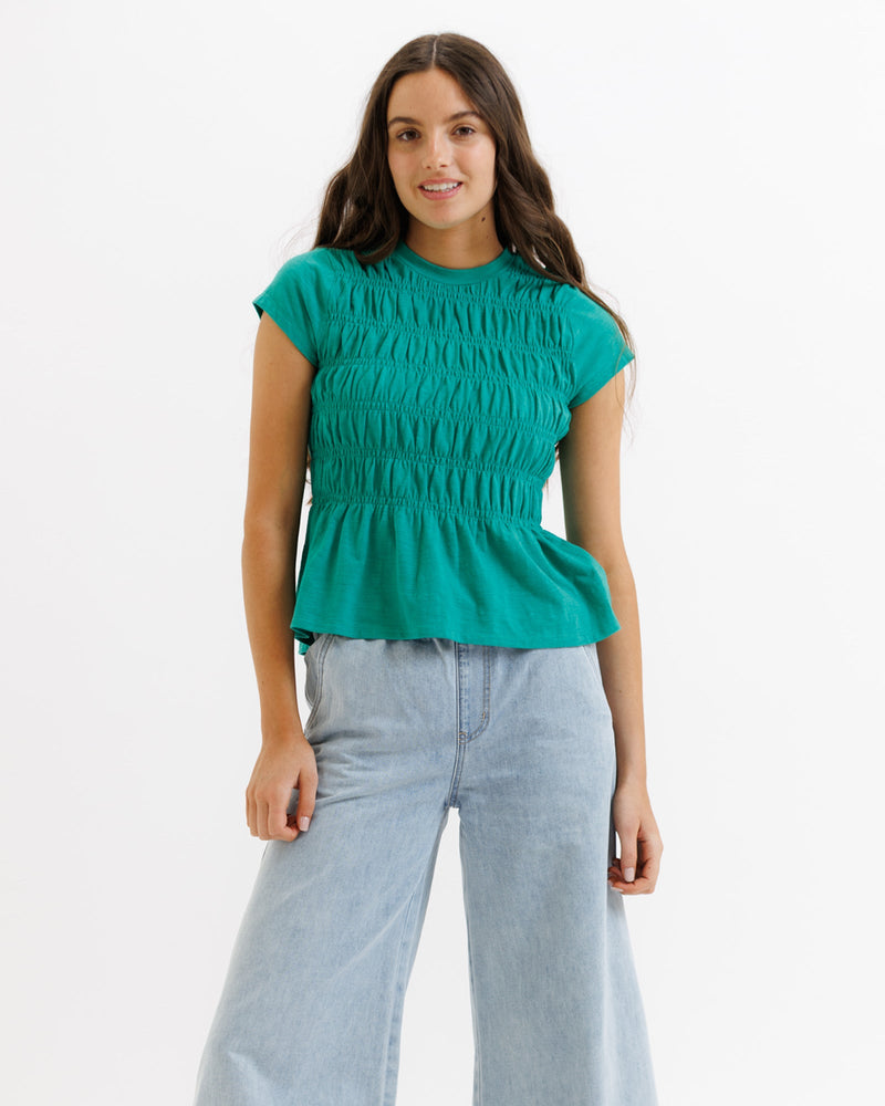 Downeast smocked tee top with a fitted bodice, short sleeves, and a casual, stylish design.