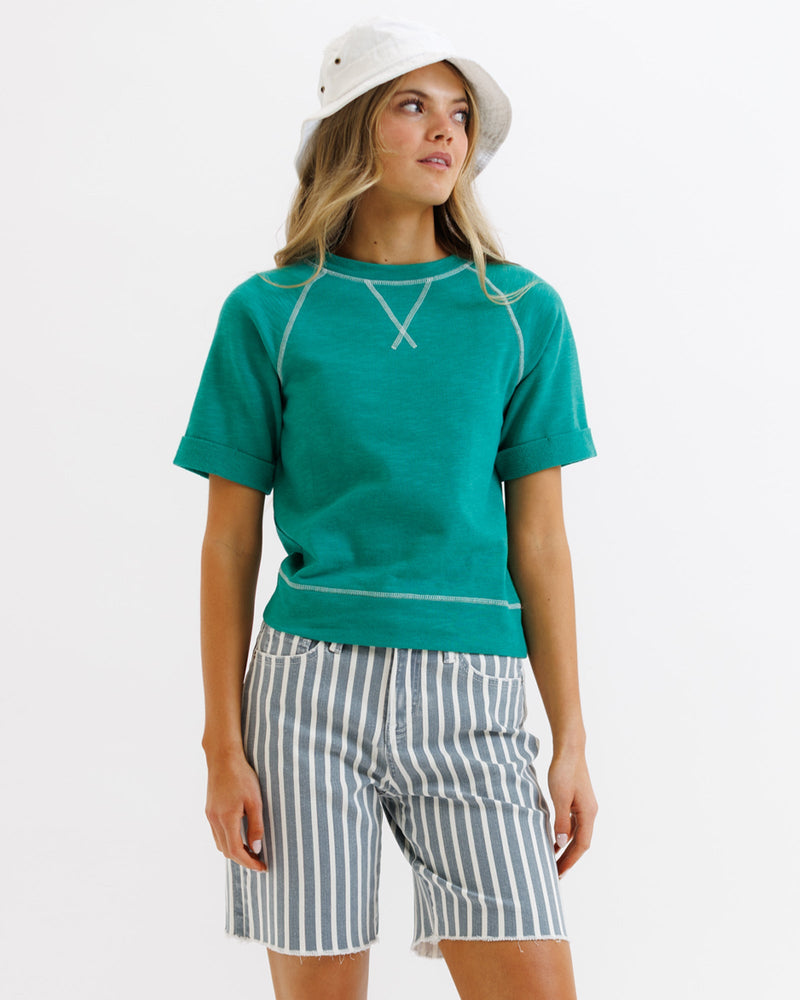 Green vintage Downeast Team Crew top, casual crewneck shirt in XS size with retro design and soft fabric.
