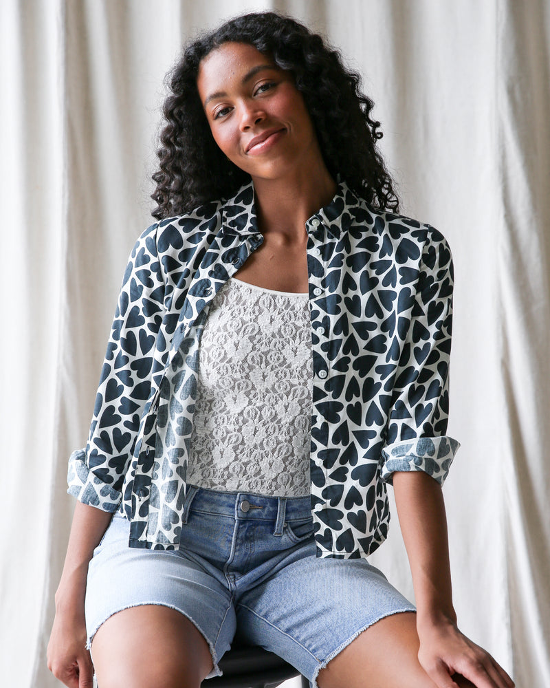 Downeast More Love top in XS featuring a heart pattern, stylish long-sleeve blouse with a feminine fit.
