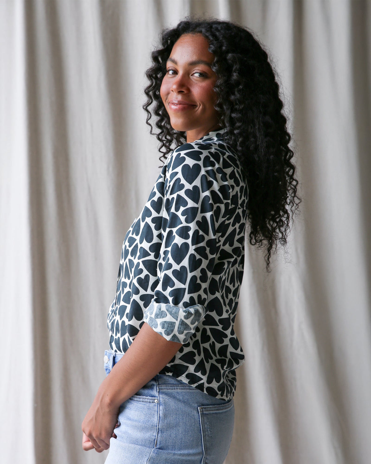 Downeast More Love Top in XS, featuring a stylish design with heart details, perfect for casual wear.