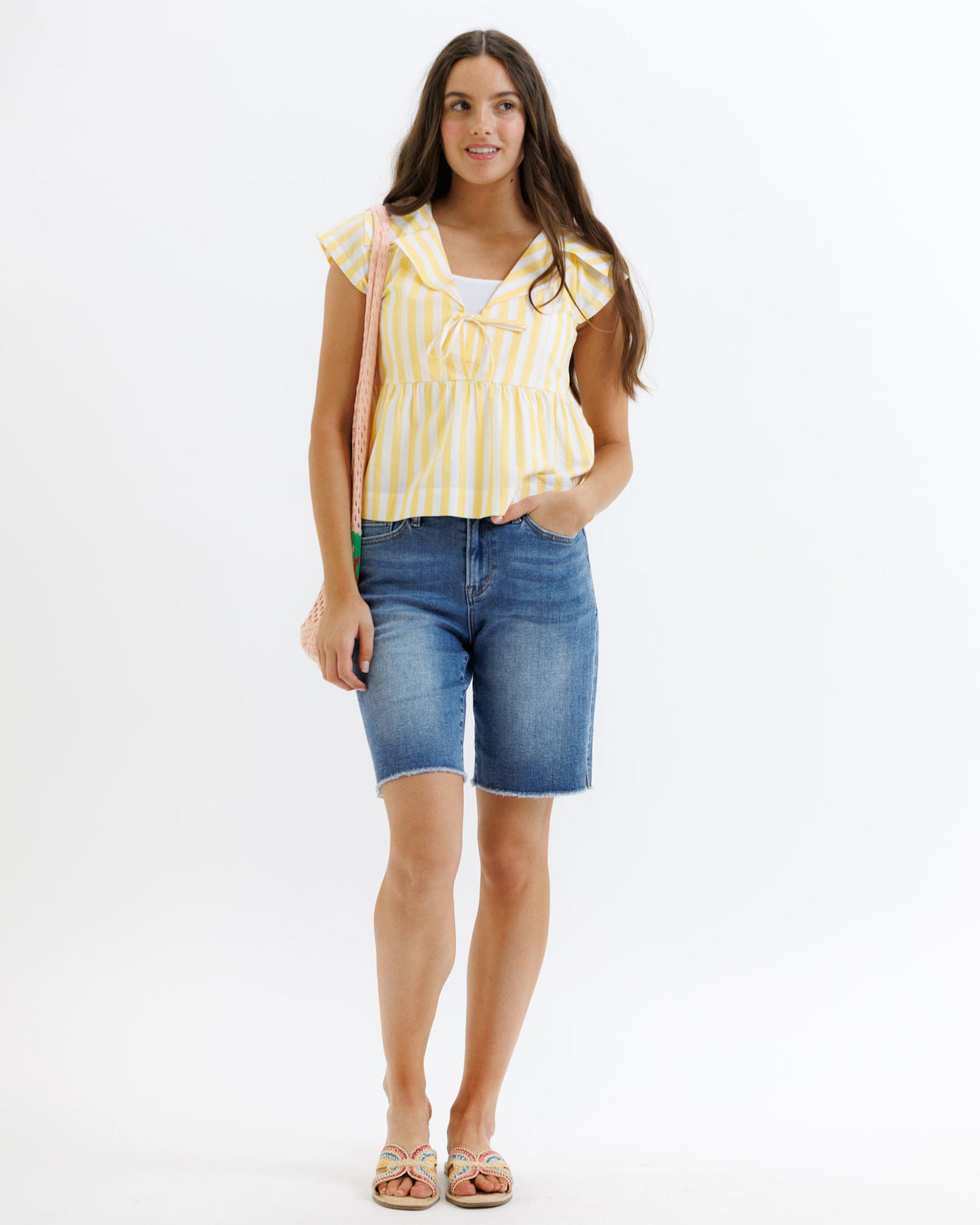 Downeast Sunshine Stripe Top for women, lightweight casual top with bright yellow and white stripes, front view.