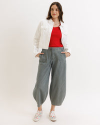 Downeast Cameo Tee, a stylish casual top with a relaxed fit and soft fabric, displayed on a hanger.