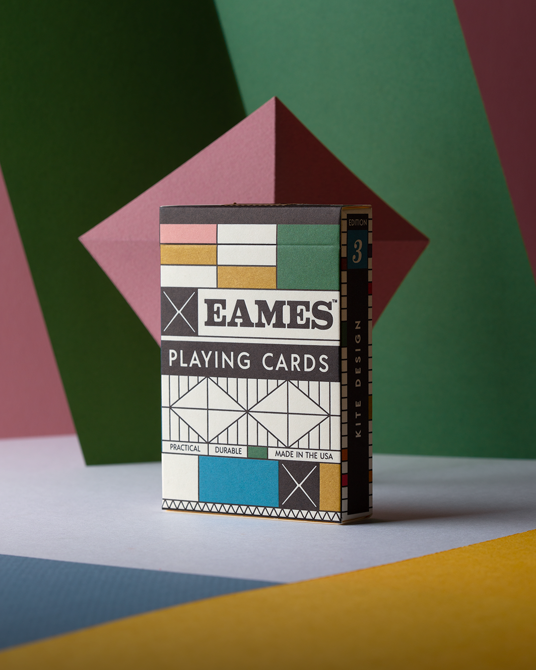 Eames "Kite" playing cards box by Art of Play featuring colorful kite design on the card packaging.