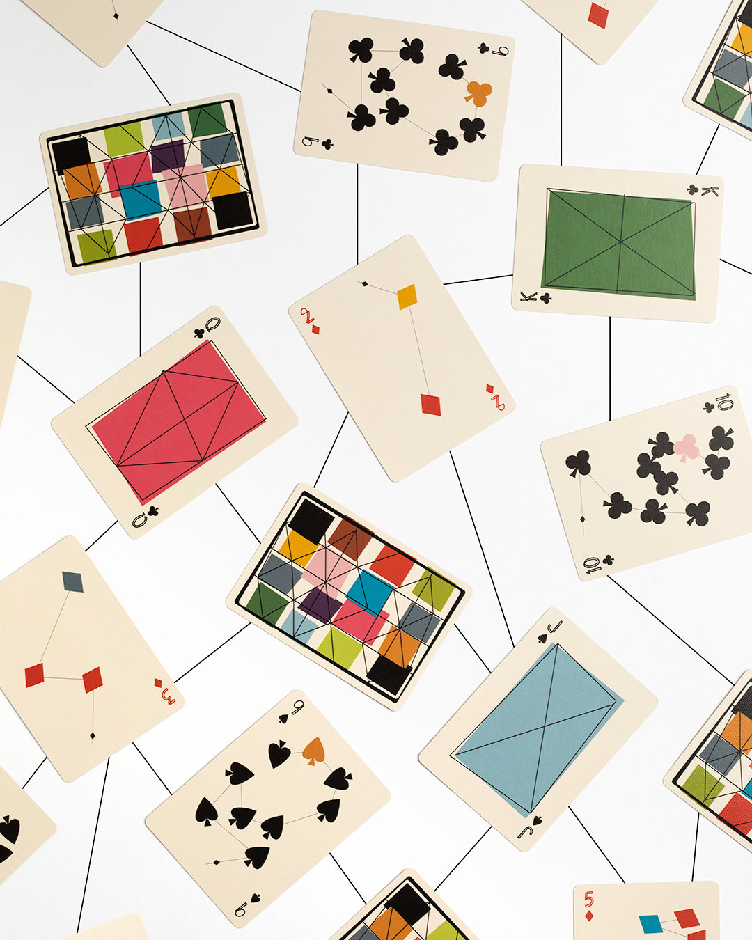 Art of Play Eames Kite playing cards featuring modern geometric designs on a grid background.