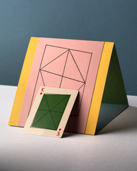 Eames "Kite" playing cards by Art of Play, featuring vibrant kite-themed design with king card visible in the image.