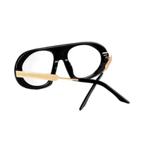 Black Saint Marc sunglasses with clear lenses by Exclusive Eyes Inc, featuring a sleek, modern design.