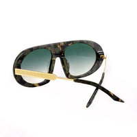 Black Saint Marc sunglasses with clear lenses by Exclusive Eyes Inc, stylish eyewear with a sleek design.