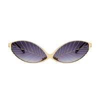 Gold leaf from Exclusive Eyes Inc. shown in an artistic close-up image highlighting its luxurious, shiny gold finish.