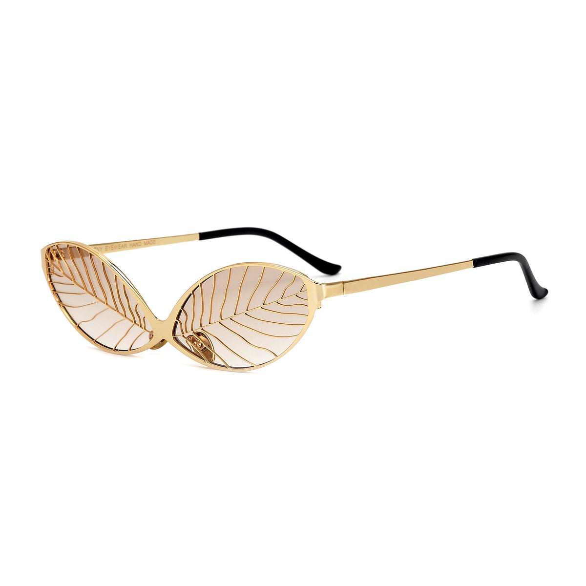 Gold leaf decorative accents from Exclusive Eyes Inc., showcasing shimmering gold leaf details on a textured surface.