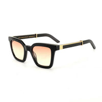 Black Master Flash sunglasses with blue light lenses by Exclusive Eyes Inc. Stylish eyewear with modern design.