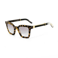Black Master Flash sunglasses with blue light lenses from Exclusive Eyes Inc, featuring sleek design and tinted blue lenses.