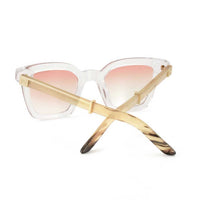 Black Master Flash sunglasses by Exclusive Eyes Inc with blue light lenses, showcasing sleek design and modern eyewear style.