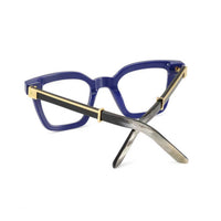 Black Master Flash sunglasses with blue light lenses by Exclusive Eyes Inc, showcasing stylish eyewear with tinted lenses.