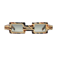 Close-up of the EXCLUSIVE EYES CREATOR sunglasses showing sleek black frames and tinted lenses.