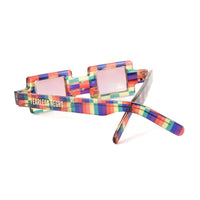 Close-up of the CREATOR sunglasses by EXCLUSIVE EYES, INC., showing sleek design and dark tinted lenses.