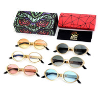 Exclusive Eyes Inc diamond sunglasses with stylish black frames and tinted lenses for a chic, modern look.