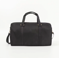 Black AdventureLight duffle bag by Fitkitty Culture, stylish accessories for gym, travel, or sports activities.