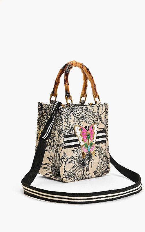 Black Forbidden Handbag by Fitkitty Culture Accessories, featuring a stylish design with sleek straps and modern details.