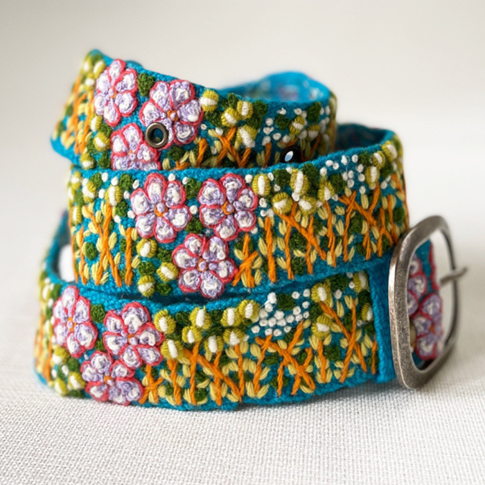 Windswept embroidered wool belt from Fitkitty Culture Accessories, featuring detailed woven pattern and soft wool material.