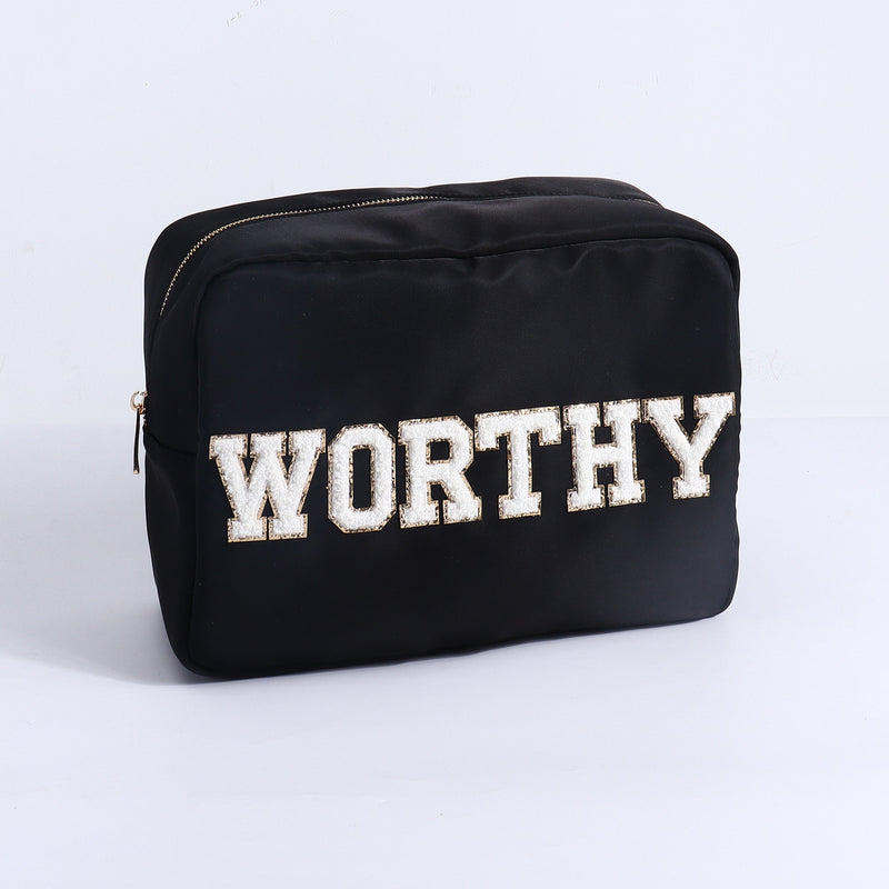 Black The Empower Luxe Carryall bag by FitKitty Culture, stylish athleisure and yoga wear accessory for women.