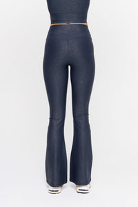 Black Luxe Edge leather-look crossover flare leggings by Fitkitty Culture, showcasing a sleek, stylish design for women's athleisure wear.