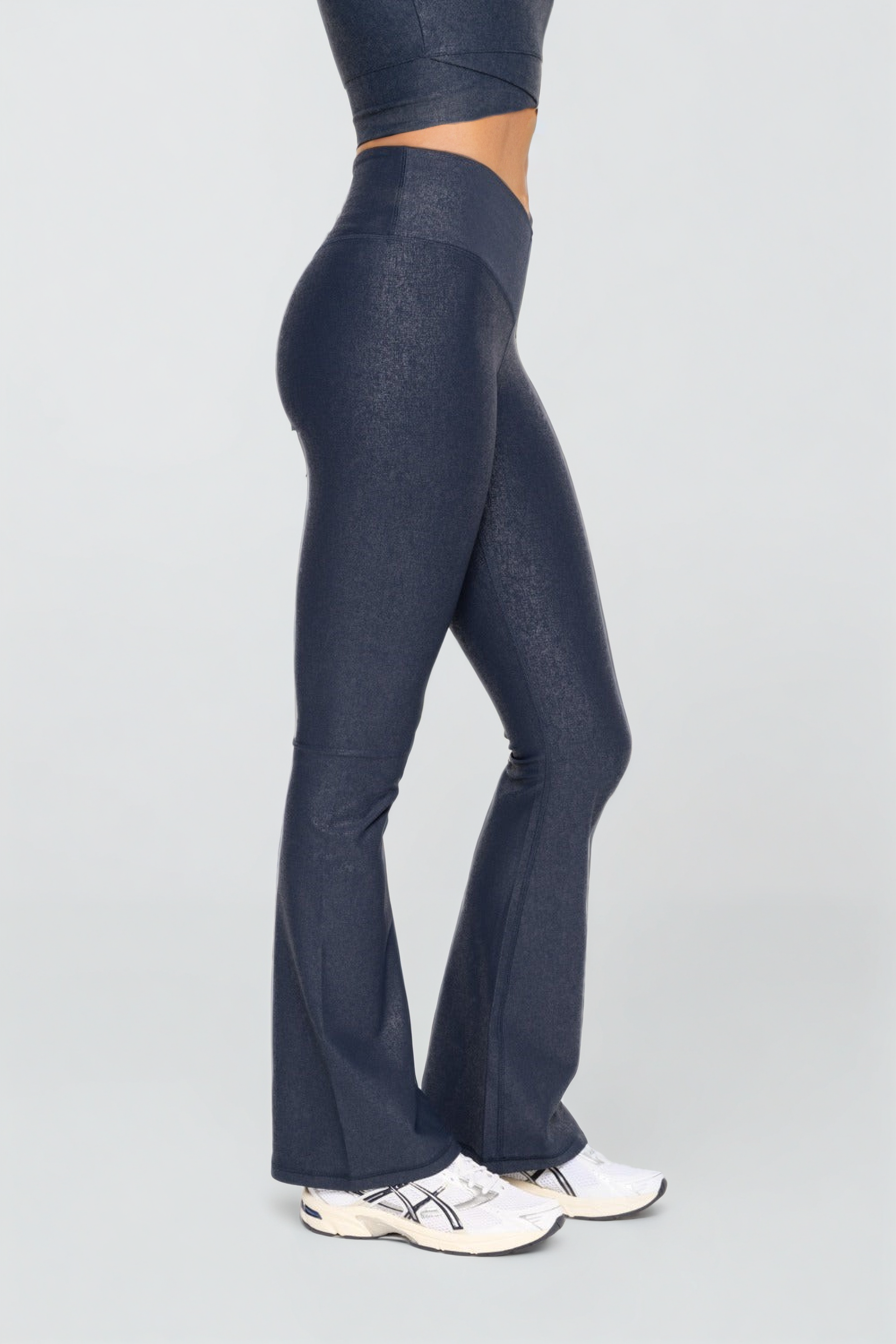 Black Luxe Edge Leather-Look Crossover Flare Leggings by Fitkitty Culture Athleisure Wear, designed for yoga and casual wear.