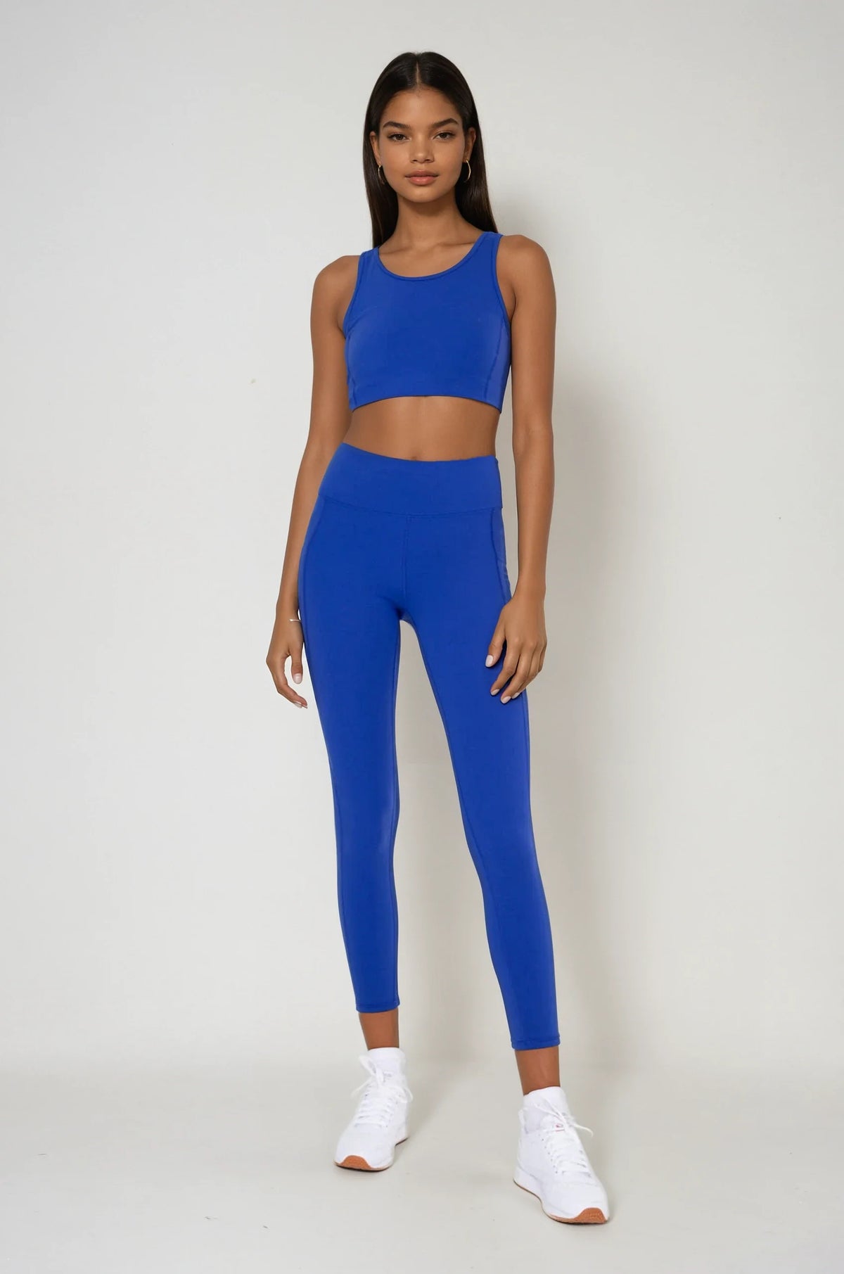 Blue Breathe Easy Cut-Out Back Sports Bra by Fitkitty Culture, made from Lycra® blend, designed for active women’s yoga and workout wear.