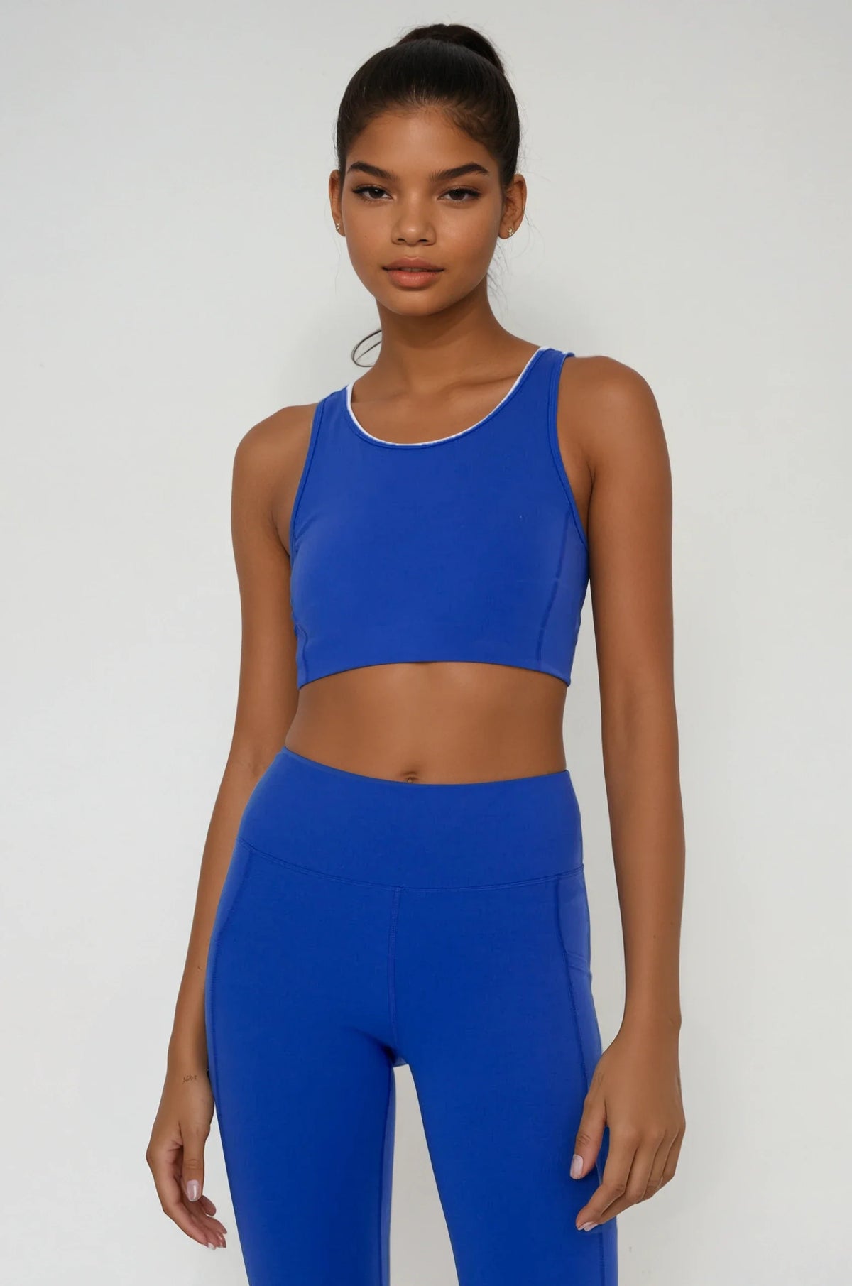 Blue Breathe Easy Cut-Out Back Sports Bra by Fitkitty Culture in Lycra blend, designed for yoga and active wear, small size.