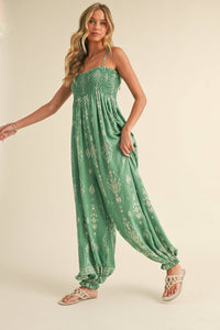 Wildflower Dreams Balloon Jumpsuit by Fitkitty Culture, featuring a vibrant floral pattern and relaxed fit for women's casual wear.