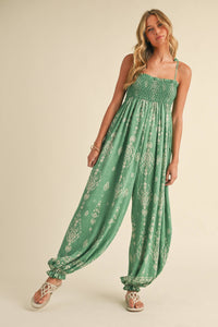 Wildflower Dreams Balloon Jumpsuit by Fitkitty Culture, featuring a flowy, colorful floral pattern and relaxed fit for women's casual wear.