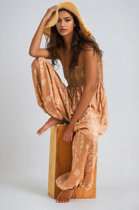 Wildflower Dreams Balloon Jumpsuit by Fitkitty Culture featuring a loose fit, floral pattern, and wide-leg design, perfect for casual wear.