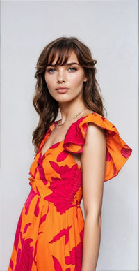 Vibrant fire floral high-low maxi dress from Fitkitty Culture, featuring bold floral patterns and flowy fabric for women.