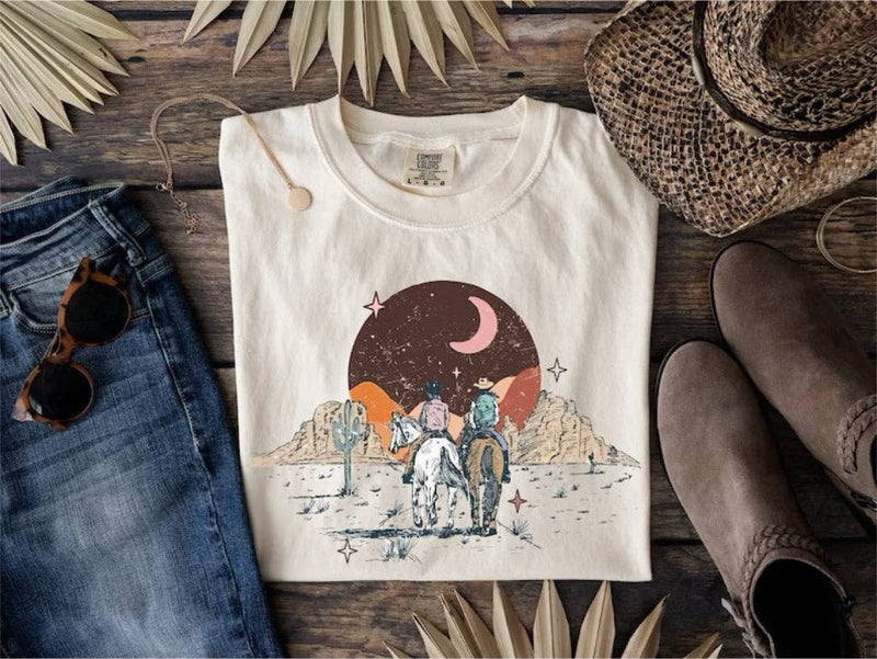 Vintage Western Boho Graphic Tee from Fitkitty Culture, featuring a colorful western-inspired design on soft casual clothing.