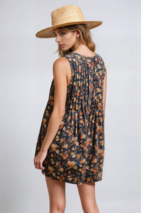 Vintage Bloom denim romper by Fitkitty Culture features a sleeveless design with floral embroidery and a relaxed fit.