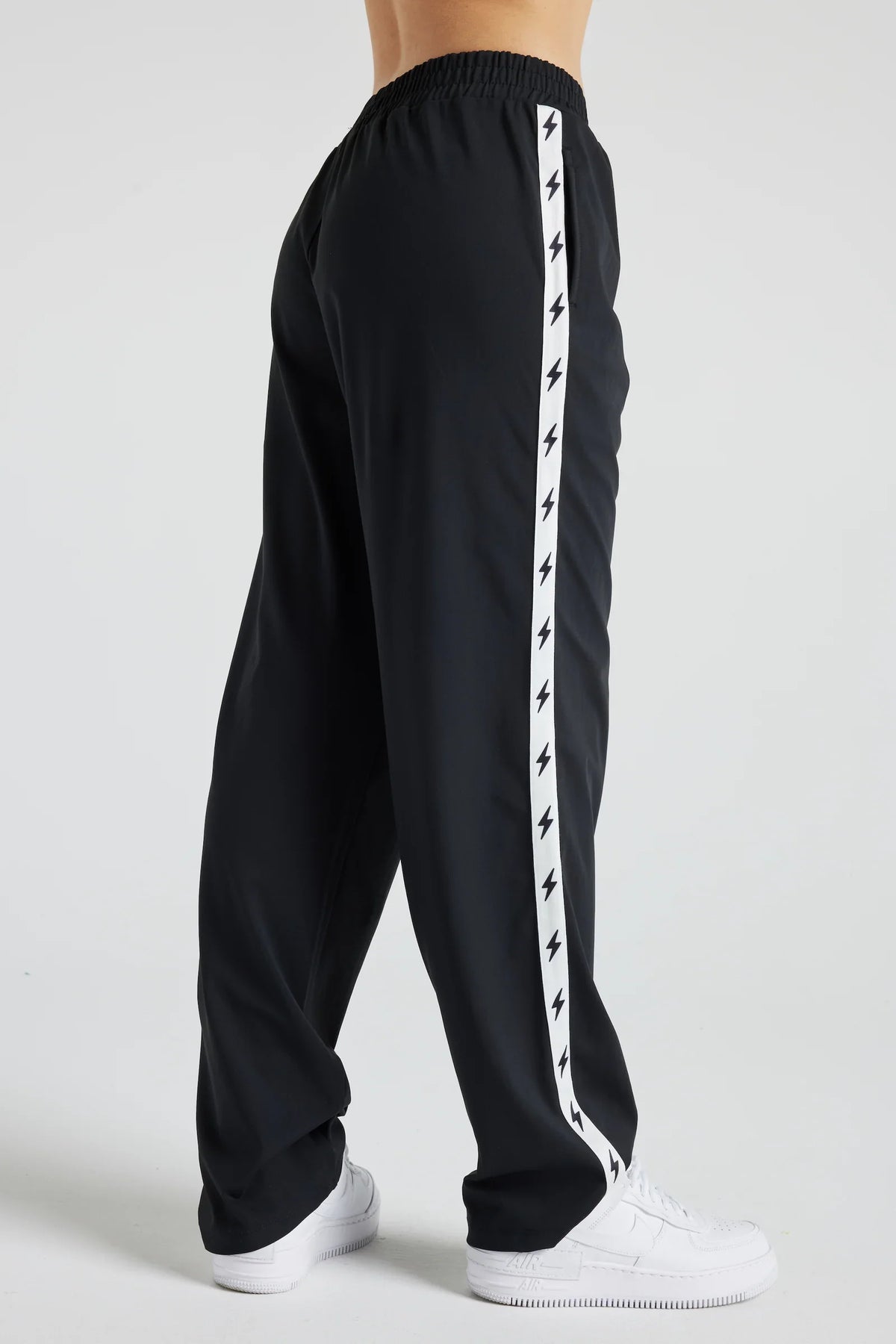Light gray Fitkitty Culture Bolt Track Pant for women, made from comfortable athleisure fabric, perfect for yoga and casual wear.