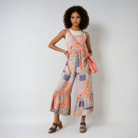 Serenity patchwork jumpsuit by Fitkitty Culture with floral print, side pockets, perfect for casual or yoga wear.