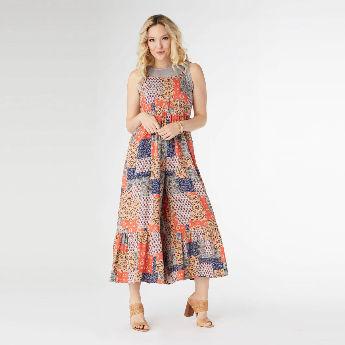 Serenity patchwork jumpsuit with floral print and side pockets, women’s athleisure wear by Fitkitty Culture.