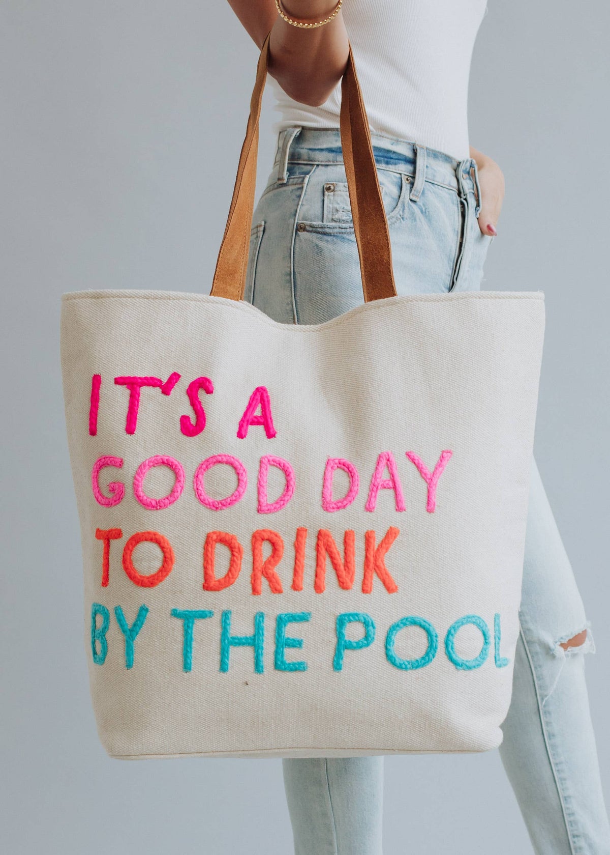 Poolside Bliss Tote bag by Fitkitty Culture, featuring a stylish design perfect for carrying essentials to the pool or beach.