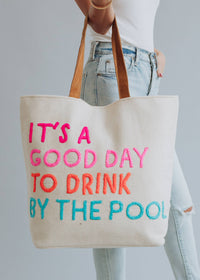 Poolside Bliss Tote bag by Fitkitty Culture, featuring a stylish design perfect for carrying essentials to the pool or beach.