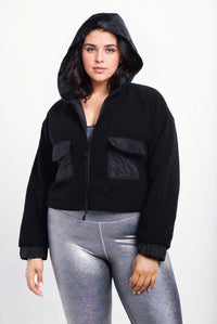 Black CURVY Sherpa Dreams cropped hooded jacket by Fitkitty Culture, featuring cozy sherpa fabric and a stylish cropped fit for women.
