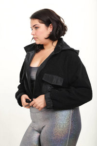 Black CURVY Sherpa Dreams cropped hooded jacket by Fitkitty Culture, featuring cozy sherpa lining and a stylish cropped fit for women.