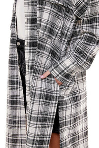 Black oversized plaid shacket, jacket by Fitkitty Culture Athleisure Wear, featuring a long, relaxed fit and classic plaid pattern.
