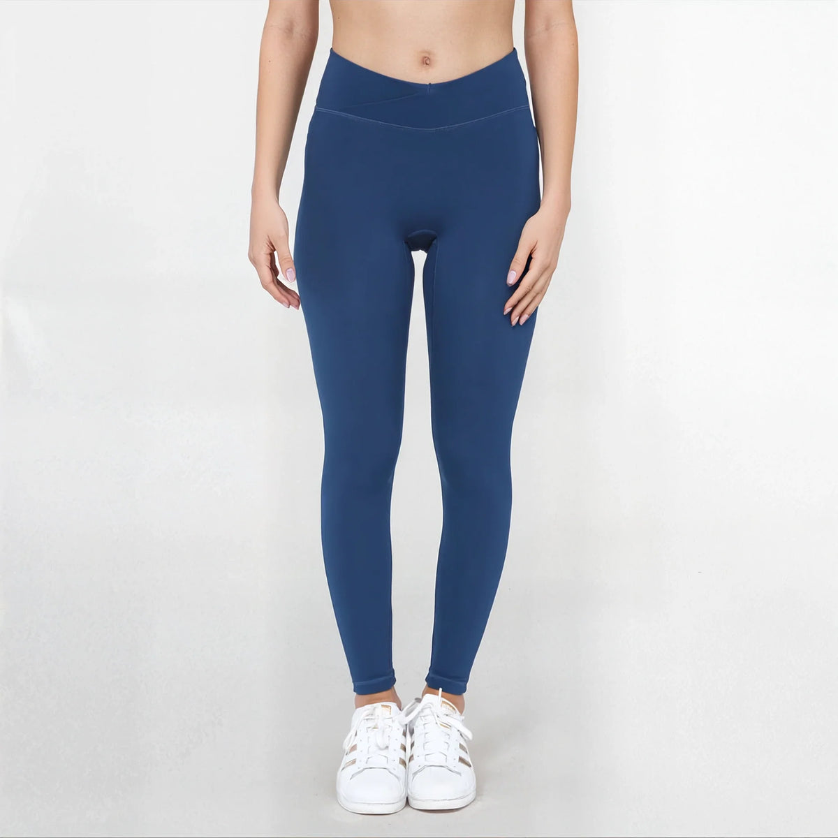 Black SmoothFit™ Crossover Leggings by Fitkitty Culture, women's athletic leggings with a sleek crossover design, ideal for yoga and activewear.