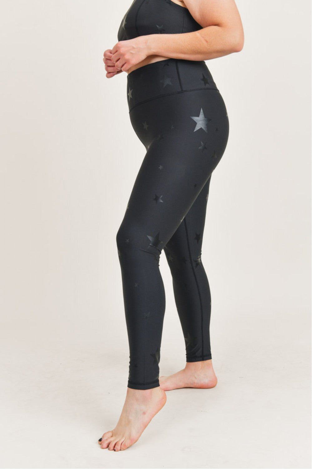 Black Starlight High Waisted Leggings by Fitkitty Culture, stylish women's yoga and athleisure wear with a comfortable fit.