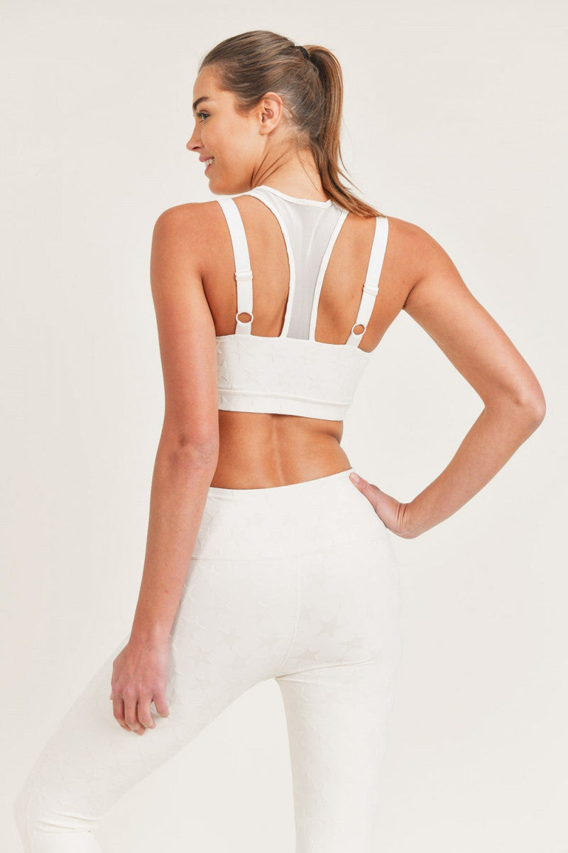 Black Joystar sports bra from Fitkitty Culture Athleisure Wear, designed for comfortable yoga and workout sessions.